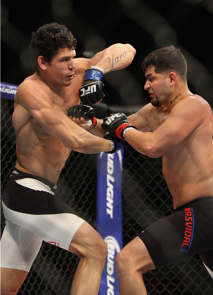 LAS VEGAS, NV - JULY 12: (L-R) Cezar Ferreira elbows Jorge Masvidal in their welterweight bout during the Ultimate Fighter Finale inside MGM Grand Garden Arena on July 12, 2015 in Las Vegas, Nevada. (Photo by Mitch Viquez/Zuffa LLC/Zuffa LLC via Getty I