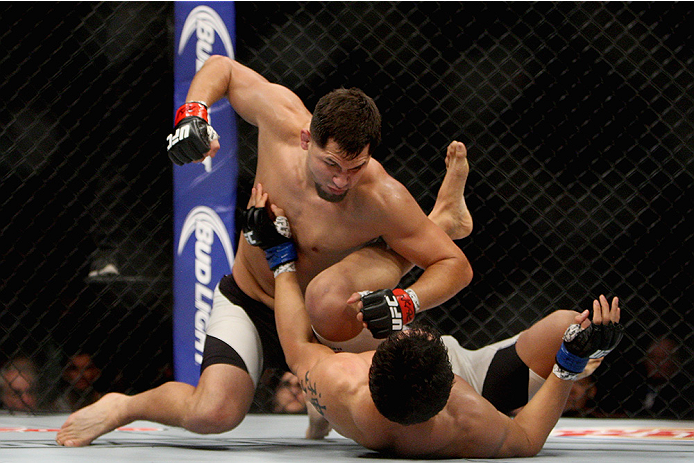 LAS VEGAS, NV - JULY 12: Jorge Masvidal (top) punches Cezar Ferreira in their welterweight bout during the Ultimate Fighter Finale inside MGM Grand Garden Arena on July 12, 2015 in Las Vegas, Nevada. (Photo by Mitch Viquez/Zuffa LLC/Zuffa LLC via Getty