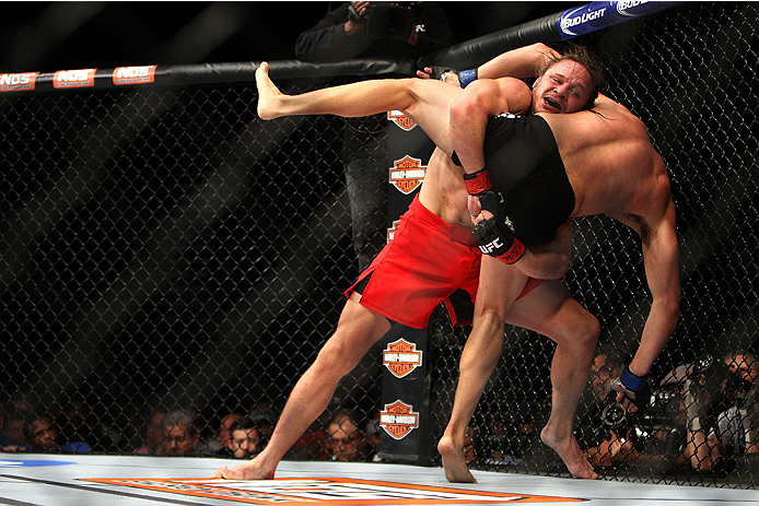 LAS VEGAS, NV - JULY 12: (L-R) Michael Graves attempts to take down Vicente Luque in their welterweight bout during the Ultimate Fighter Finale inside MGM Grand Garden Arena on July 12, 2015 in Las Vegas, Nevada. (Photo by Mitch Viquez/Zuffa LLC/Zuffa L