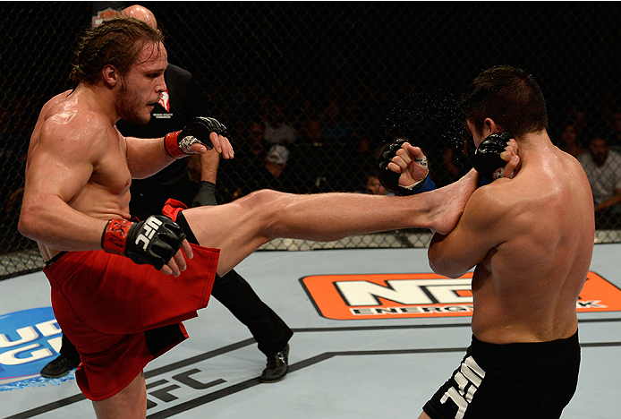 LAS VEGAS, NV - JULY 12: (L-R) Michael Graves kicks Vicente Luque in their welterweight bout during the Ultimate Fighter Finale inside MGM Grand Garden Arena on July 12, 2015 in Las Vegas, Nevada. (Photo by Brandon Magnus/Zuffa LLC/Zuffa LLC via Getty I