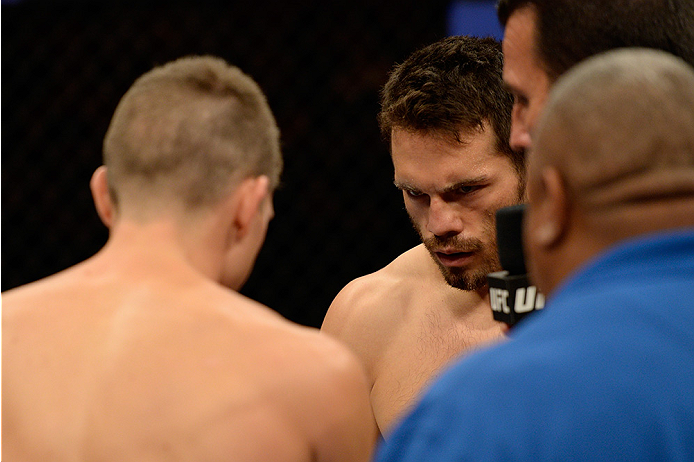 LAS VEGAS, NV - JULY 12: (L-R) Stephen Thompson and Jake Ellenberger face off in their welterweight bout during the Ultimate Fighter Finale inside MGM Grand Garden Arena on July 12, 2015 in Las Vegas, Nevada. (Photo by Brandon Magnus/Zuffa LLC/Zuffa LLC