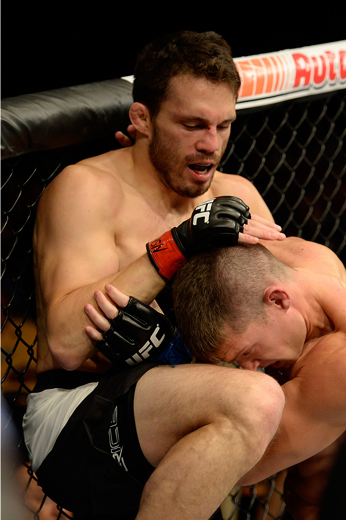 LAS VEGAS, NV - JULY 12: (L-R) Jake Ellenberger knees Stephen Thompson in their welterweight bout during the Ultimate Fighter Finale inside MGM Grand Garden Arena on July 12, 2015 in Las Vegas, Nevada. (Photo by Brandon Magnus/Zuffa LLC/Zuffa LLC via Ge