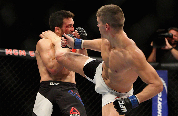 LAS VEGAS, NV - JULY 12: (R-L) Stephen Thompson kicks Jake Ellenberger in their welterweight bout during the Ultimate Fighter Finale inside MGM Grand Garden Arena on July 12, 2015 in Las Vegas, Nevada. (Photo by Mitch Viquez/Zuffa LLC/Zuffa LLC via Gett