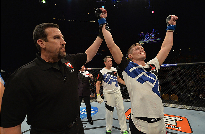 LAS VEGAS, NV - JULY 12: Stephen Thompson (right) reacts to his victory over Jake Ellenberger in their welterweight bout during the Ultimate Fighter Finale inside MGM Grand Garden Arena on July 12, 2015 in Las Vegas, Nevada. (Photo by Brandon Magnus/Zuf
