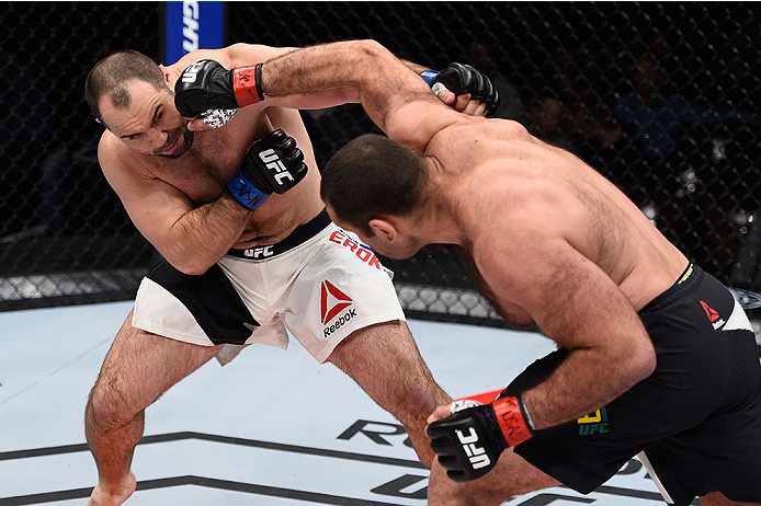 LAS VEGAS, NV - DECEMBER 11: (R-L) Gabriel Gonzaga punches Konstantin Erokhin in their heavyweight bout during the TUF Finale event inside The Chelsea at The Cosmopolitan of Las Vegas on December 11, 2015 in Las Vegas, Nevada. (Photo by Jeff Bottari/Zuff