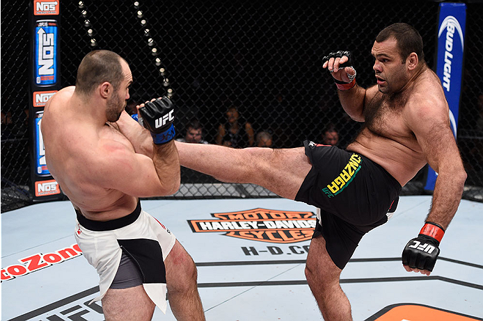 LAS VEGAS, NV - DECEMBER 11: (R-L) Gabriel Gonzaga kicks Konstantin Erokhin in their heavyweight bout during the TUF Finale event inside The Chelsea at The Cosmopolitan of Las Vegas on December 11, 2015 in Las Vegas, Nevada. (Photo by Jeff Bottari/Zuffa