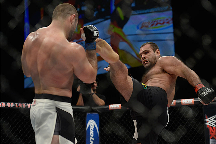 LAS VEGAS, NV - DECEMBER 11: (R-L) Gabriel Gonzaga kicks Konstantin Erokhin in their heavyweight bout during the TUF Finale event inside The Chelsea at The Cosmopolitan of Las Vegas on December 11, 2015 in Las Vegas, Nevada. (Photo by Brandon Magnus/Zuff