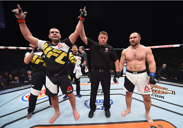LAS VEGAS, NV - DECEMBER 11: Gabriel Gonzaga (left) is declared the winner against Konstantin Erokhin (right) in their heavyweight bout during the TUF Finale event inside The Chelsea at The Cosmopolitan of Las Vegas on December 11, 2015 in Las Vegas, Neva