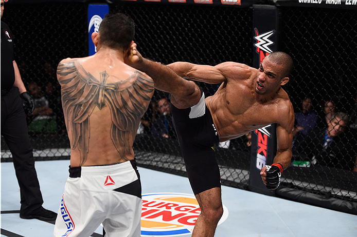 LAS VEGAS, NV - DECEMBER 11: (R-L) Edson Barboza kicks Tony Ferguson in their lightweight bout during the TUF Finale event inside The Chelsea at The Cosmopolitan of Las Vegas on December 11, 2015 in Las Vegas, Nevada. (Photo by Jeff Bottari/Zuffa LLC/Zuf