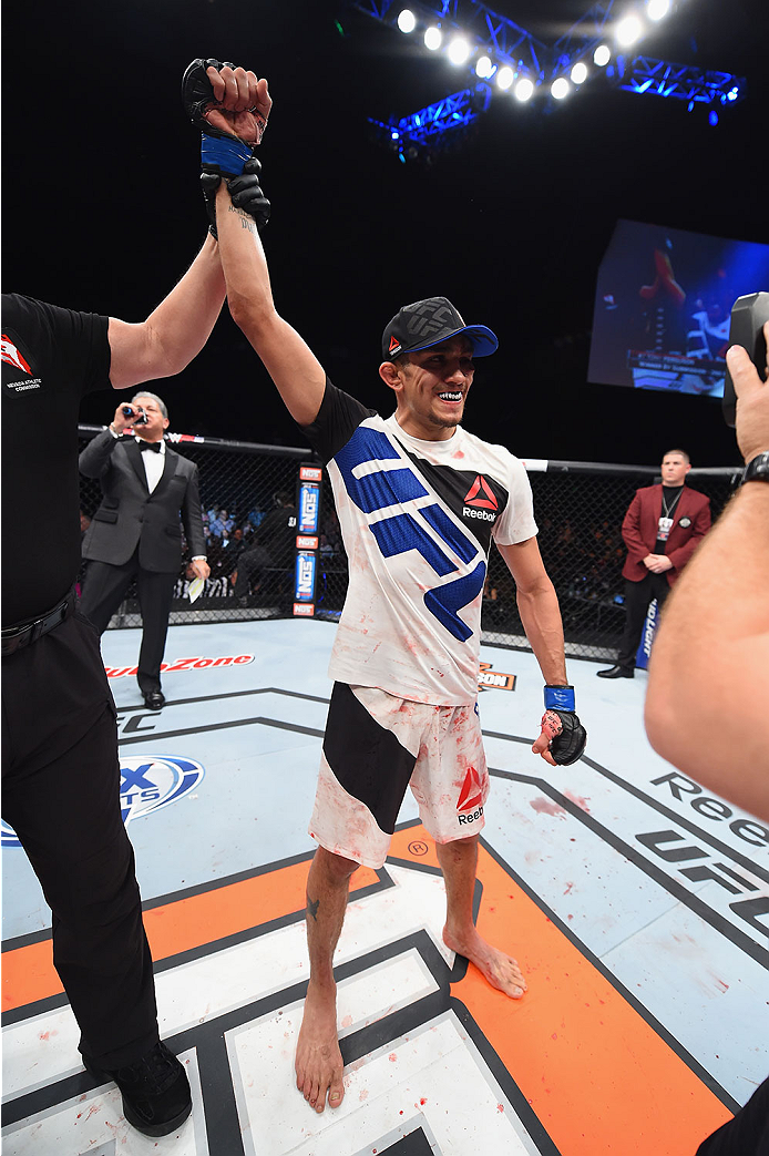LAS VEGAS, NV - DECEMBER 11: Tony Ferguson reacts to his victory over Edson Barboza in their lightweight bout during the TUF Finale event inside The Chelsea at The Cosmopolitan of Las Vegas on December 11, 2015 in Las Vegas, Nevada. (Photo by Jeff Bottar