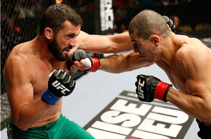 QUEBEC CITY, CANADA - APRIL 16: (R-L) Nordine Taleb and Vik Grujic trade punches in their middleweight fight during the TUF Nations Finale at Colisee Pepsi on April 16, 2014 in Quebec City, Quebec, Canada. (Photo by Josh Hedges/Zuffa LLC/Zuffa LLC via Ge