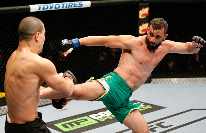 QUEBEC CITY, CANADA - APRIL 16: (R-L) Vik Grujic kicks Nordine Taleb in their middleweight fight during the TUF Nations Finale at Colisee Pepsi on April 16, 2014 in Quebec City, Quebec, Canada. (Photo by Josh Hedges/Zuffa LLC/Zuffa LLC via Getty Images)