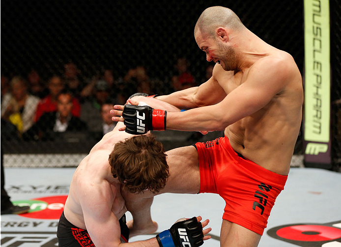 QUEBEC CITY, CANADA - APRIL 16: (R-L) Chad Laprise knees Olivier Aubin-Mercier in their welterweight fight during the TUF Nations Finale at Colisee Pepsi on April 16, 2014 in Quebec City, Quebec, Canada. (Photo by Josh Hedges/Zuffa LLC/Zuffa LLC via Gett
