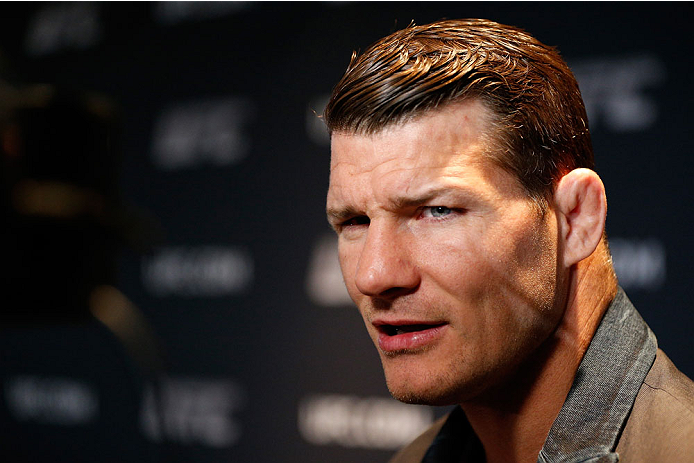 QUEBEC CITY, CANADA - APRIL 14: Michael Bisping interacts with media during the UFC Ultimate Media Day at the TRYP Quebec Hotel on April 14, 2014 in Quebec City, Quebec, Canada. (Photo by Josh Hedges/Zuffa LLC/Zuffa LLC via Getty Images)