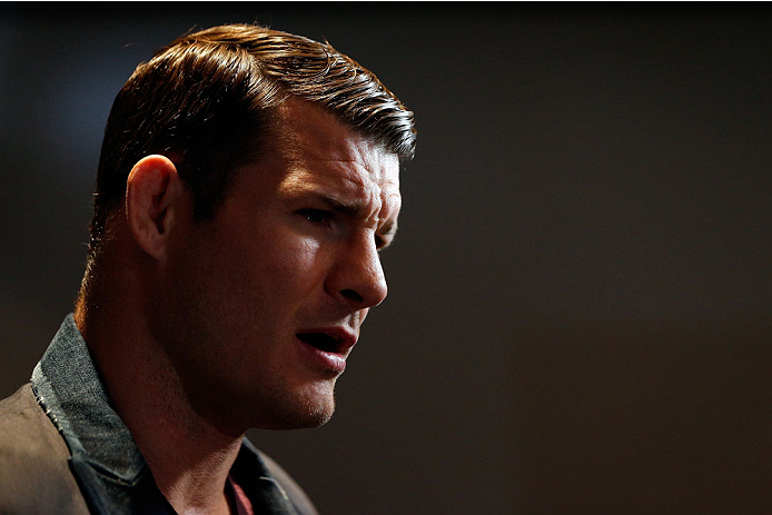 QUEBEC CITY, CANADA - APRIL 14: Michael Bisping interacts with media during the UFC Ultimate Media Day at the TRYP Quebec Hotel on April 14, 2014 in Quebec City, Quebec, Canada. (Photo by Josh Hedges/Zuffa LLC/Zuffa LLC via Getty Images)