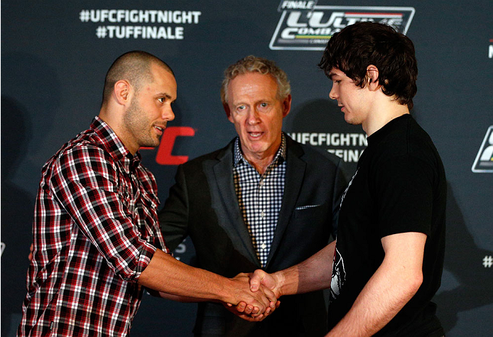 QUEBEC CITY, CANADA - APRIL 14: (L-R) Opponents Chad Laprise and Olivier Aubin-Mercier shake hands during the UFC Ultimate Media Day at the TRYP Quebec Hotel on April 14, 2014 in Quebec City, Quebec, Canada. (Photo by Josh Hedges/Zuffa LLC/Zuffa LLC via