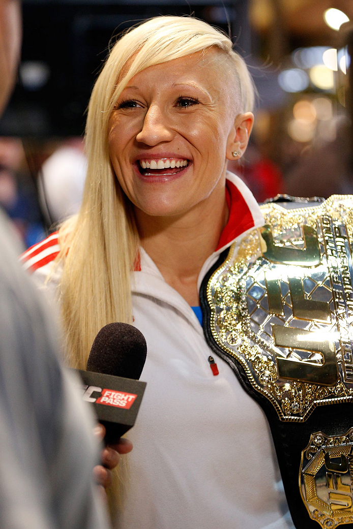 QUEBEC CITY, CANADA - APRIL 13: Canadian Olympic gold medalist Kaillie Humphries interacts with media during the UFC open workouts at the Centre Commercial Place Fleur de Lys on April 13, 2014 in Quebec City, Quebec, Canada. (Photo by Josh Hedges/Zuffa L