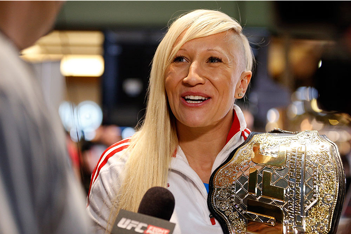 QUEBEC CITY, CANADA - APRIL 13: Canadian Olympic gold medalist Kaillie Humphries interacts with media during the UFC open workouts at the Centre Commercial Place Fleur de Lys on April 13, 2014 in Quebec City, Quebec, Canada. (Photo by Josh Hedges/Zuffa L
