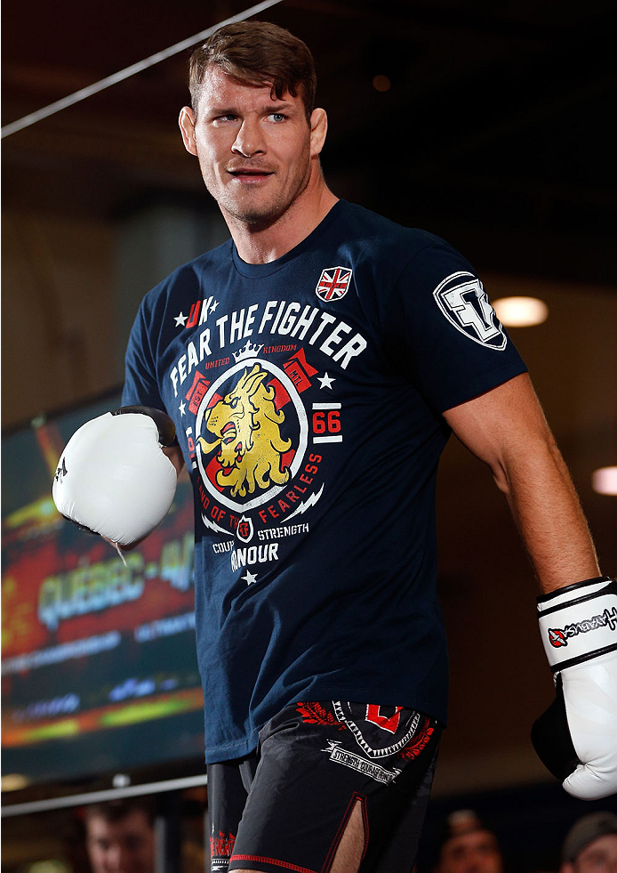 QUEBEC CITY, CANADA - APRIL 13: Michael Bisping holds an open training session for fans and media at the Centre Commercial Place Fleur de Lys on April 13, 2014 in Quebec City, Quebec, Canada. (Photo by Josh Hedges/Zuffa LLC/Zuffa LLC via Getty Images)
