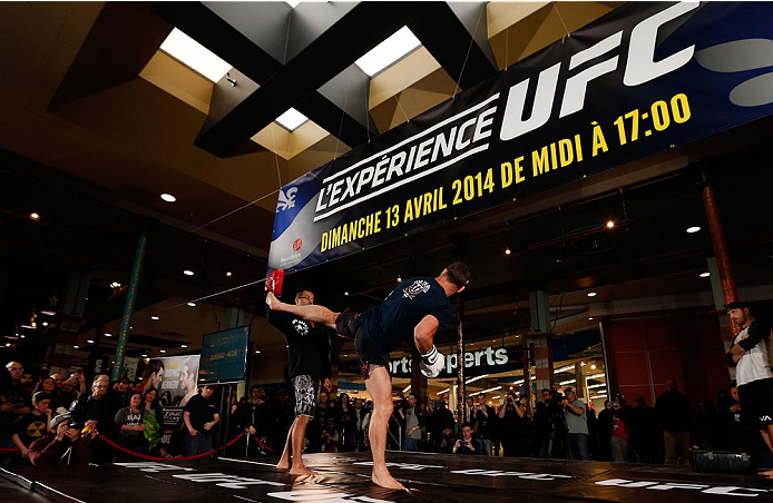 QUEBEC CITY, CANADA - APRIL 13: Michael Bisping holds an open training session for fans and media at the Centre Commercial Place Fleur de Lys on April 13, 2014 in Quebec City, Quebec, Canada. (Photo by Josh Hedges/Zuffa LLC/Zuffa LLC via Getty Images)