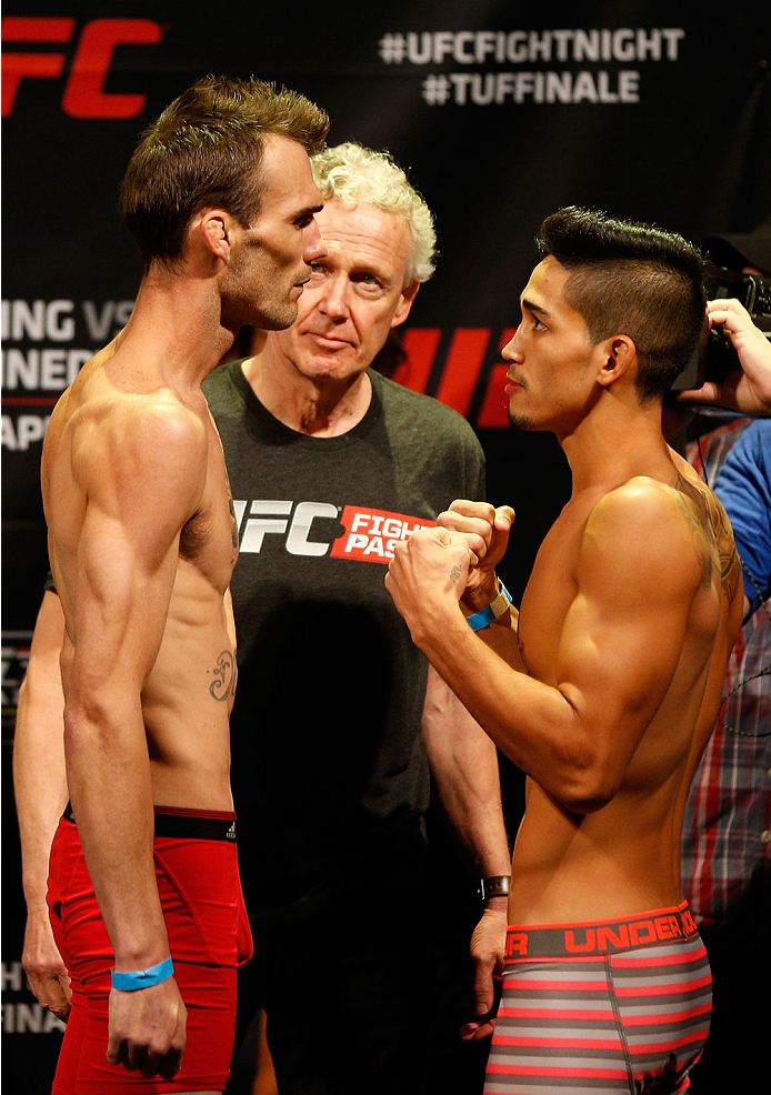 QUEBEC CITY, CANADA - APRIL 15: (L-R) Opponents George Roop and Dustin Kimura face off during the TUF Nations Finale weigh-in at Colisee Pepsi on April 15, 2014 in Quebec City, Quebec, Canada. (Photo by Josh Hedges/Zuffa LLC/Zuffa LLC via Getty Images)