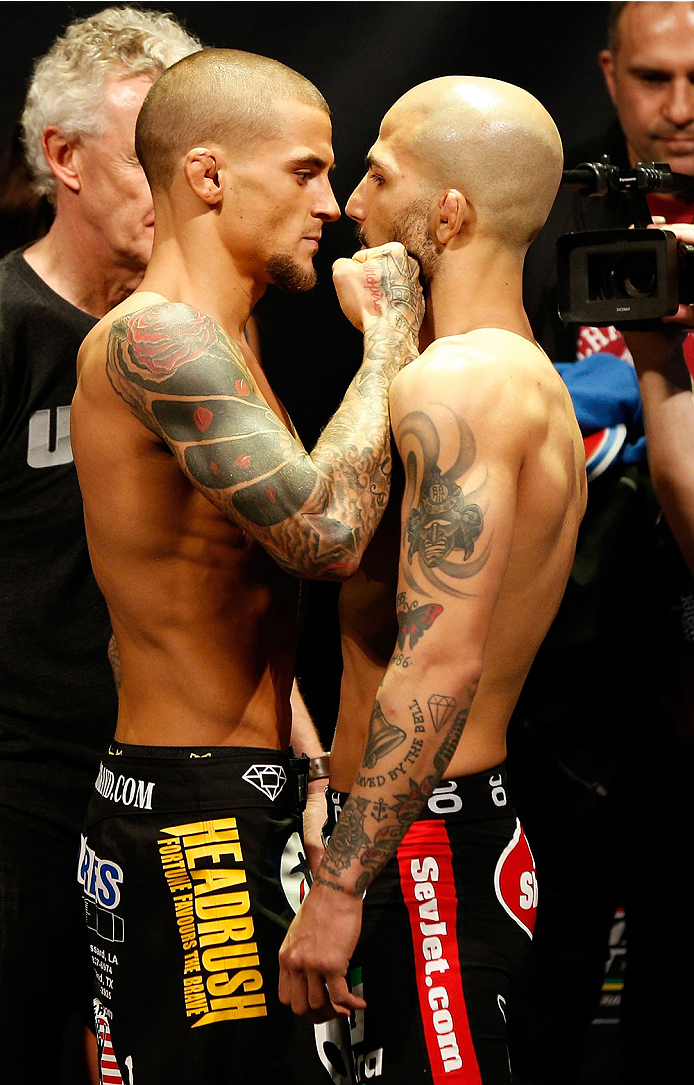 QUEBEC CITY, CANADA - APRIL 15: (L-R) Opponents Dustin Poirier and Akira Corassani face off during the TUF Nations Finale weigh-in at Colisee Pepsi on April 15, 2014 in Quebec City, Quebec, Canada. (Photo by Josh Hedges/Zuffa LLC/Zuffa LLC via Getty Imag