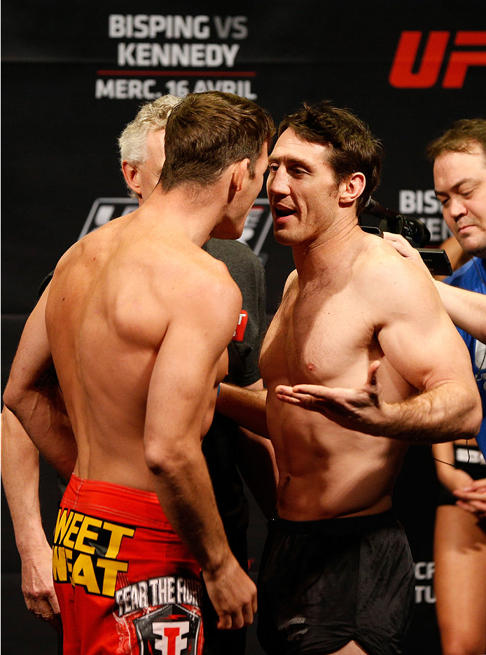 QUEBEC CITY, CANADA - APRIL 15: (L-R) Opponents Michael Bisping and Tim Kennedy face off during the TUF Nations Finale weigh-in at Colisee Pepsi on April 15, 2014 in Quebec City, Quebec, Canada. (Photo by Josh Hedges/Zuffa LLC/Zuffa LLC via Getty Images)