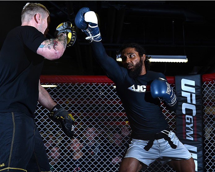 BOSTON, MA - JANUARY 15: UFC lightweight Benson 'Smooth' Henderson (R) holds an open workout session for the media and fans at UFC Gym on January 15, 2015 in Boston, Massachusetts. (Photo by Jeff Bottari/Zuffa LLC/Zuffa LLC via Getty Images)