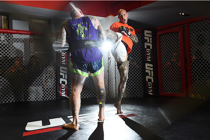 BOSTON, MA - JANUARY 15: UFC lightweight Donald 'Cowboy' Cerrone (R) works out for the media and fans during the open workouts session at UFC Gym on January 15, 2015 in Boston, Massachusetts. (Photo by Jeff Bottari/Zuffa LLC/Zuffa LLC via Getty Images)