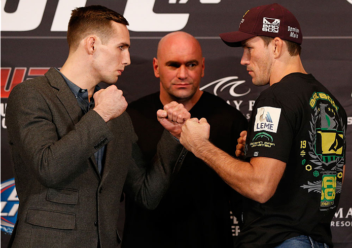 LAS VEGAS, NV - FEBRUARY 20: (L-R) Opponents Rory MacDonald and Demian Maia face off during the final UFC 170 pre-fight press conference at the Mandalay Bay Resort and Casino on February 20, 2014 in Las Vegas, Nevada. (Photo by Josh Hedges/Zuffa LLC/Zuff