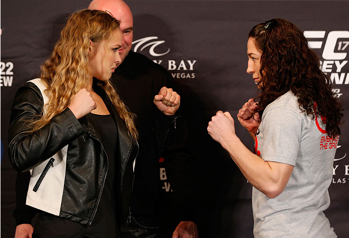 LAS VEGAS, NV - FEBRUARY 20: (L-R) Opponents Ronda Rousey and Sara McMann face off during the final UFC 170 pre-fight press conference at the Mandalay Bay Resort and Casino on February 20, 2014 in Las Vegas, Nevada. (Photo by Josh Hedges/Zuffa LLC/Zuffa