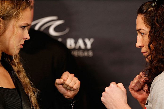 LAS VEGAS, NV - FEBRUARY 20: (L-R) Opponents Ronda Rousey and Sara McMann face off during the final UFC 170 pre-fight press conference at the Mandalay Bay Resort and Casino on February 20, 2014 in Las Vegas, Nevada. (Photo by Josh Hedges/Zuffa LLC/Zuffa
