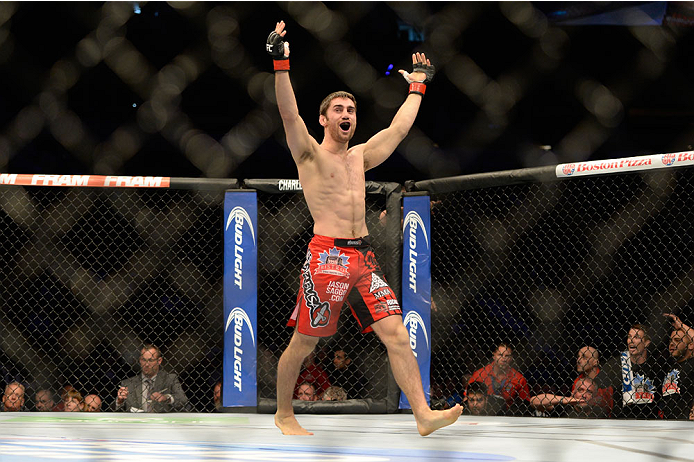 VANCOUVER, BC - JUNE 14: Jason Saggo celebrates after a defeating Josh Shockley by TKO during the UFC 174 event at Rogers Arena on June 14, 2014 in Vancouver, British Columbia, Canada. (Photo by Jeff Bottari/Zuffa LLC/Zuffa LLC via Getty Images)