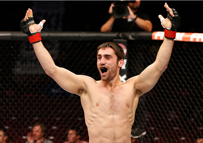 VANCOUVER, BC - JUNE 14: Jason Saggo reacts after his TKO victory over Josh Shockley in their lightweight bout at Rogers Arena on June 14, 2014 in Vancouver, Canada. (Photo by Josh Hedges/Zuffa LLC/Zuffa LLC via Getty Images)