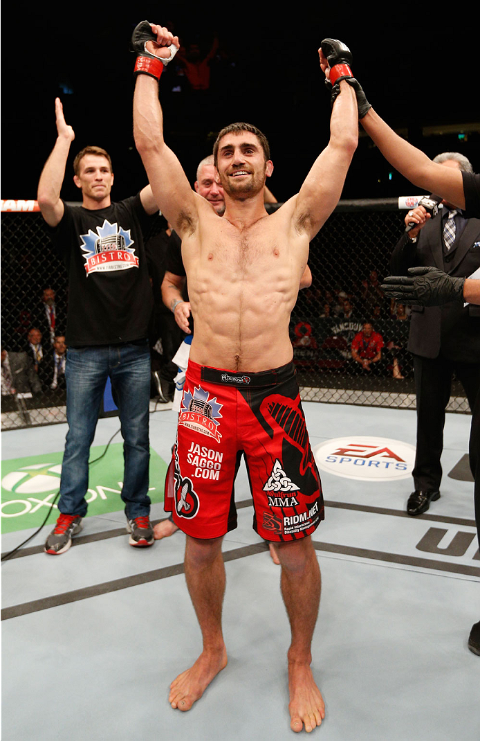 VANCOUVER, BC - JUNE 14: Jason Saggo reacts after his TKO victory over Josh Shockley in their lightweight bout at Rogers Arena on June 14, 2014 in Vancouver, Canada. (Photo by Josh Hedges/Zuffa LLC/Zuffa LLC via Getty Images)