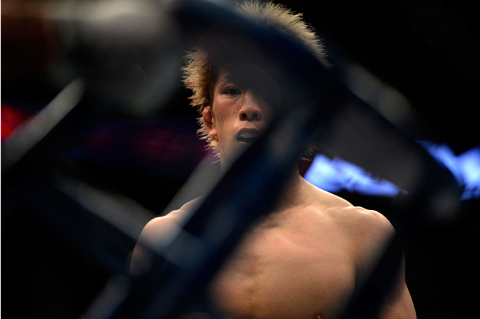 VANCOUVER, BC - JUNE 14: Michinori Tanaka walks back to his corner between rounds against Roland Delorme during the UFC 174 event at Rogers Arena on June 14, 2014 in Vancouver, British Columbia, Canada. (Photo by Jeff Bottari/Zuffa LLC/Zuffa LLC via Gett