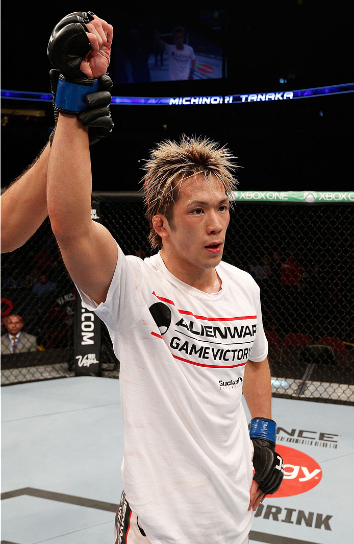 VANCOUVER, BC - JUNE 14: Michinori Tanaka reacts after his decision victory over Roland Delorme in their bantamweight bout at Rogers Arena on June 14, 2014 in Vancouver, Canada. (Photo by Josh Hedges/Zuffa LLC/Zuffa LLC via Getty Images)