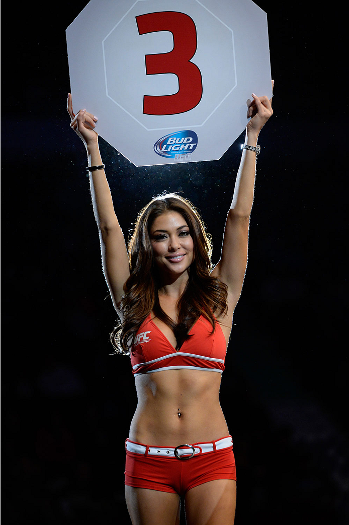 VANCOUVER, BC - JUNE 14: UFC Octagon Girl Arianny Celeste signals the start of round three between Michinori Tanaka and Roland Delorme during the UFC 174 event at Rogers Arena on June 14, 2014 in Vancouver, British Columbia, Canada. (Photo by Jeff Bottar