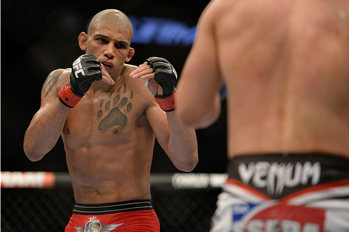 VANCOUVER, BC - JUNE 14: (L-R) Kajan Johnson looks to strike Tae Hyun Bang during the UFC 174 event at Rogers Arena on June 14, 2014 in Vancouver, British Columbia, Canada. (Photo by Jeff Bottari/Zuffa LLC/Zuffa LLC via Getty Images)