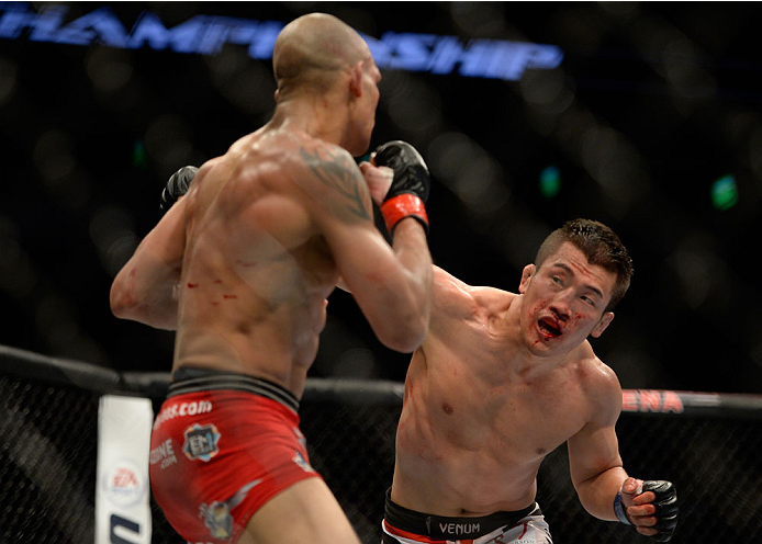 VANCOUVER, BC - JUNE 14: (R-L) Tae Hyun Bang punches Kajan Johnson during the UFC 174 event at Rogers Arena on June 14, 2014 in Vancouver, British Columbia, Canada. (Photo by Jeff Bottari/Zuffa LLC/Zuffa LLC via Getty Images)