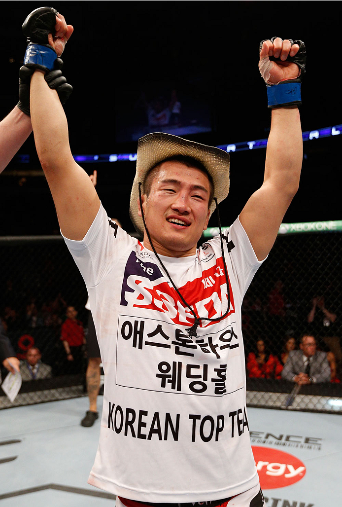 VANCOUVER, BC - JUNE 14: Tae Hyun Bang reacts after his knockout victory over Kajan Johnson in their lightweight bout at Rogers Arena on June 14, 2014 in Vancouver, Canada. (Photo by Josh Hedges/Zuffa LLC/Zuffa LLC via Getty Images)
