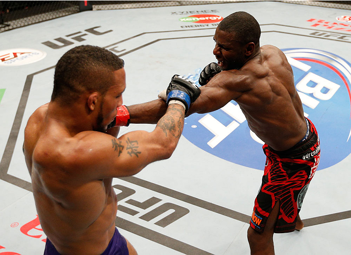 VANCOUVER, BC - JUNE 14: (R-L) Yves Jabouin punches Mike Easton in their bantamweight bout at Rogers Arena on June 14, 2014 in Vancouver, Canada. (Photo by Josh Hedges/Zuffa LLC/Zuffa LLC via Getty Images)