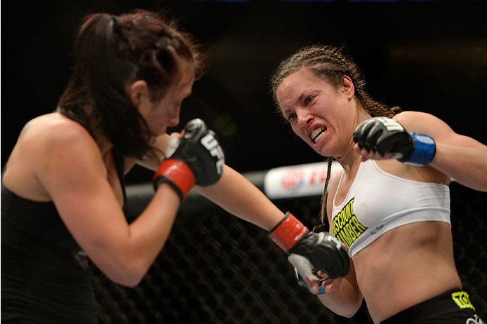 VANCOUVER, BC - JUNE 14: (R-L) Elizabeth Phillips punches Valerie Latourneau during the UFC 174 event at Rogers Arena on June 14, 2014 in Vancouver, British Columbia, Canada. (Photo by Jeff Bottari/Zuffa LLC/Zuffa LLC via Getty Images)