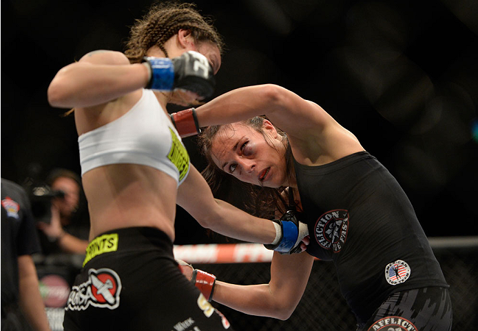 VANCOUVER, BC - JUNE 14: (L-R) Elizabeth Phillips punches Valerie Latourneau during the UFC 174 event at Rogers Arena on June 14, 2014 in Vancouver, British Columbia, Canada. (Photo by Jeff Bottari/Zuffa LLC/Zuffa LLC via Getty Images)