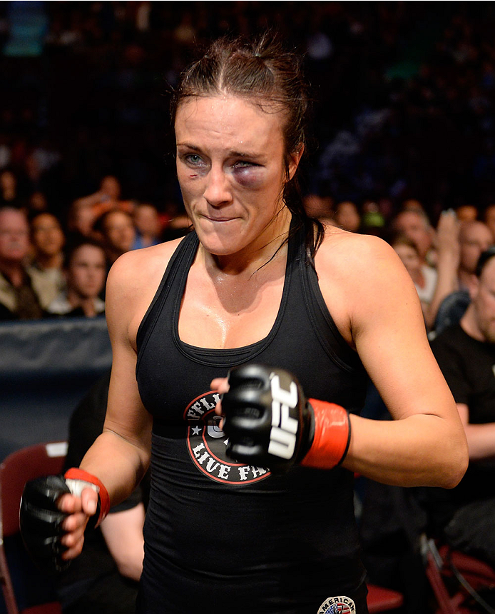 VANCOUVER, BC - JUNE 14: Valerie Latourneau celebrates after a split decision win over Elizabeth Phillips during the UFC 174 event at Rogers Arena on June 14, 2014 in Vancouver, British Columbia, Canada. (Photo by Jeff Bottari/Zuffa LLC/Zuffa LLC via Get