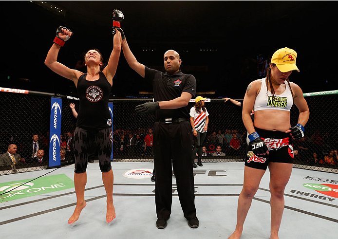 VANCOUVER, BC - JUNE 14: Valerie Letourneau reacts after her split decision victory over Elizabeth Phillips in their womens bantamweight bout at Rogers Arena on June 14, 2014 in Vancouver, Canada. (Photo by Josh Hedges/Zuffa LLC/Zuffa LLC via Getty Imag
