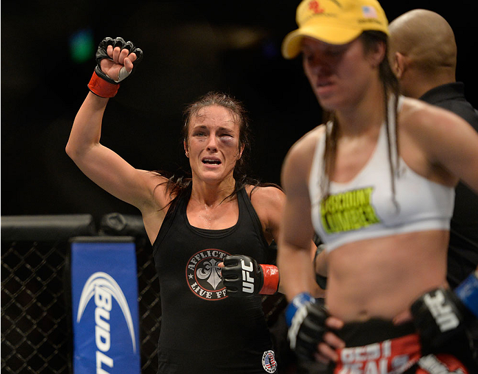 VANCOUVER, BC - JUNE 14: (L-R) Valerie Latourneau celebrates after a split decision win over Elizabeth Phillips during the UFC 174 event at Rogers Arena on June 14, 2014 in Vancouver, British Columbia, Canada. (Photo by Jeff Bottari/Zuffa LLC/Zuffa LLC v