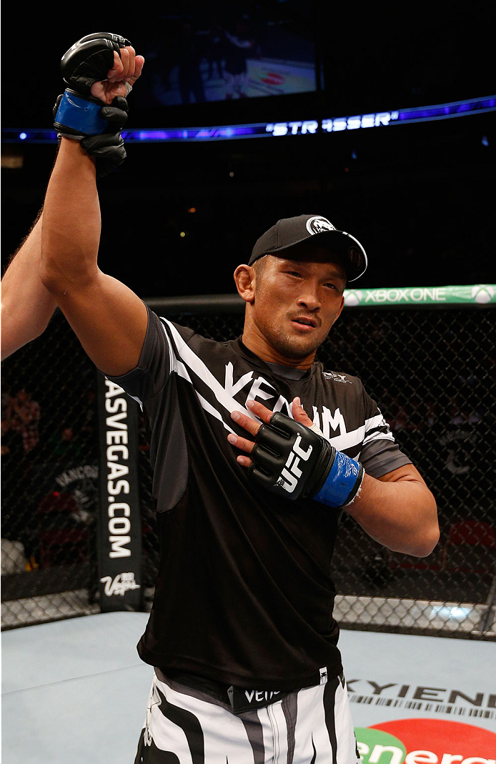 VANCOUVER, BC - JUNE 14: Kiichi Kunimoto reacts after his submission victory over Daniel Sarafian in their welterweight bout at Rogers Arena on June 14, 2014 in Vancouver, Canada. (Photo by Josh Hedges/Zuffa LLC/Zuffa LLC via Getty Images)