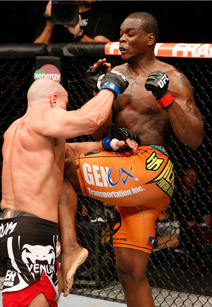 VANCOUVER, BC - JUNE 14: (R-L) Ovince Saint Preux knees Ryan Jimmo in their light heavyweight bout at Rogers Arena on June 14, 2014 in Vancouver, Canada. (Photo by Josh Hedges/Zuffa LLC/Zuffa LLC via Getty Images)