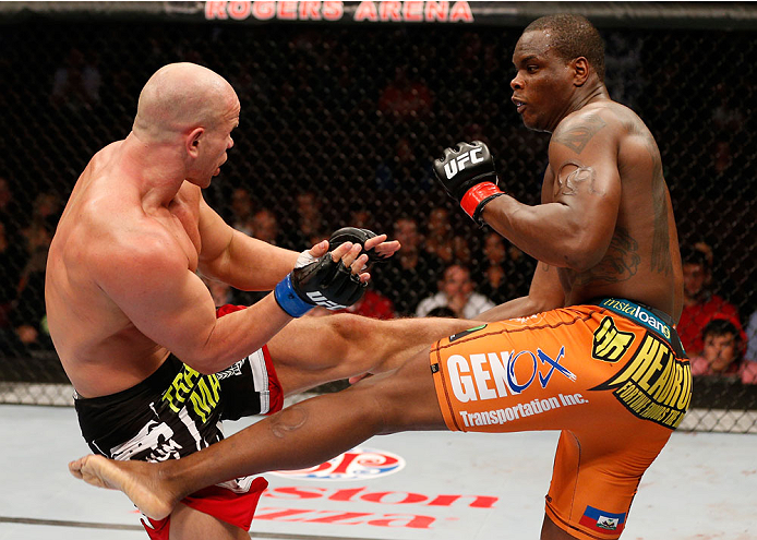 VANCOUVER, BC - JUNE 14: (R-L) Ovince Saint Preux and Ryan Jimmo trade kicks in their light heavyweight bout at Rogers Arena on June 14, 2014 in Vancouver, Canada. (Photo by Josh Hedges/Zuffa LLC/Zuffa LLC via Getty Images)